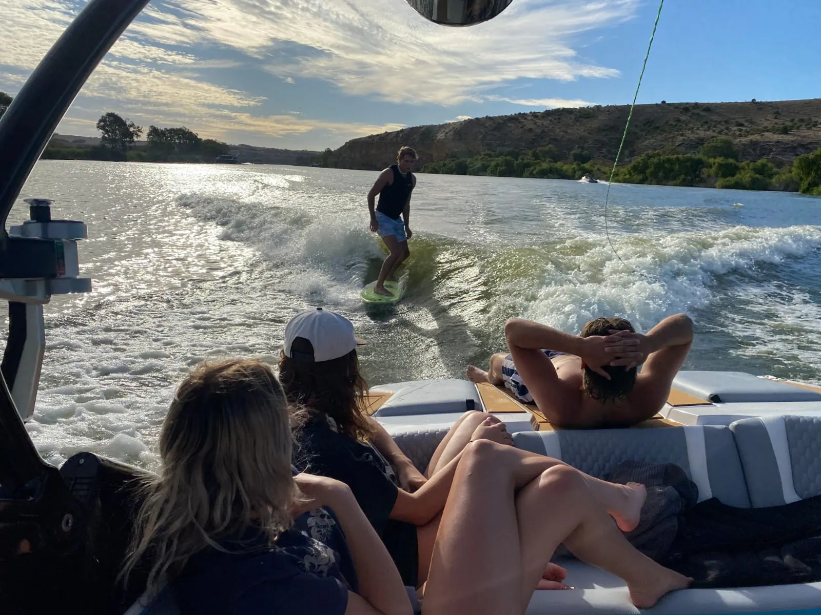 Watching a wakeboarder from the MX22 rear lounge